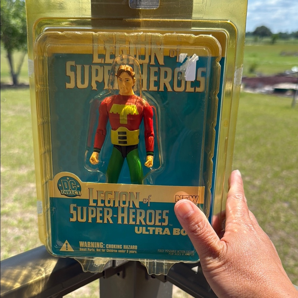 Red and Yellow Superhero Action Figure Collectible